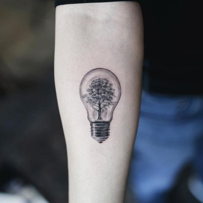 Bulb tree tattoo on forearm