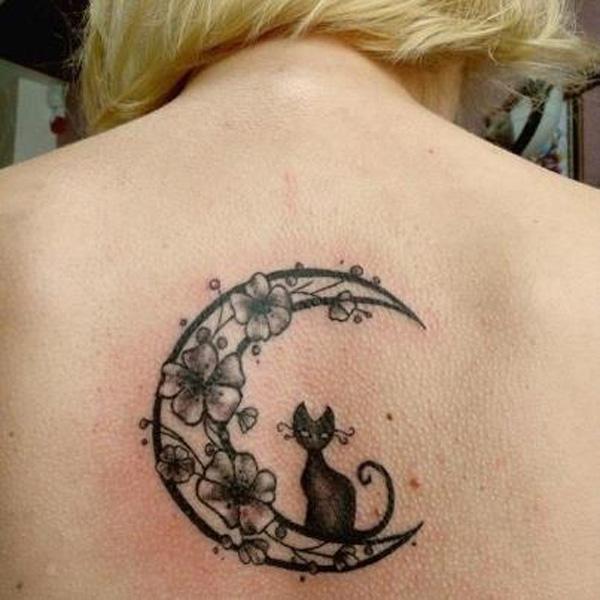 Cat and flower moon tattoo on the back