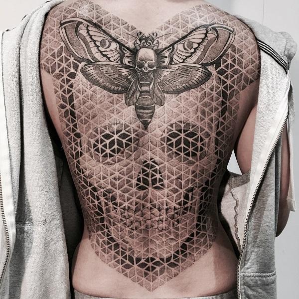 Skull tattoo with Mosaic tiles and butterfly